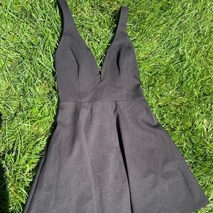 Amazing little black dress with open back
